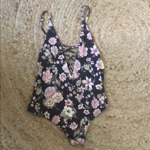 Billabong size SM floral one piece low back w/ tie